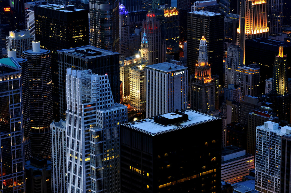 Aerial view of illuminated downtown Chicago skyscrapers at night